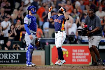 Jun 29, 2025; Houston, Texas, USA; Houston Astros second baseman Jose Altuve (27) crosses home plate after hitting a two-run home run to left field against the Chicago Cubs during the fifth inning at Daikin Park. Mandatory Credit: Erik Williams-Imagn Images