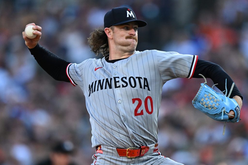 Jun 29, 2025; Detroit, Michigan, USA; Minnesota Twins starting pitcher Chris Paddack (20) throws a pitch against the Detroit Tigers in the third inning at Comerica Park. Mandatory Credit: Lon Horwedel-Imagn Images