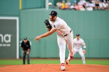 Jun 30, 2025; Boston, Massachusetts, USA;  Boston Red Sox starting pitcher Garrett Crochet (35) pitches during the first against the Cincinnati Reds at Fenway Park. Mandatory Credit: Bob DeChiara-Imagn Images