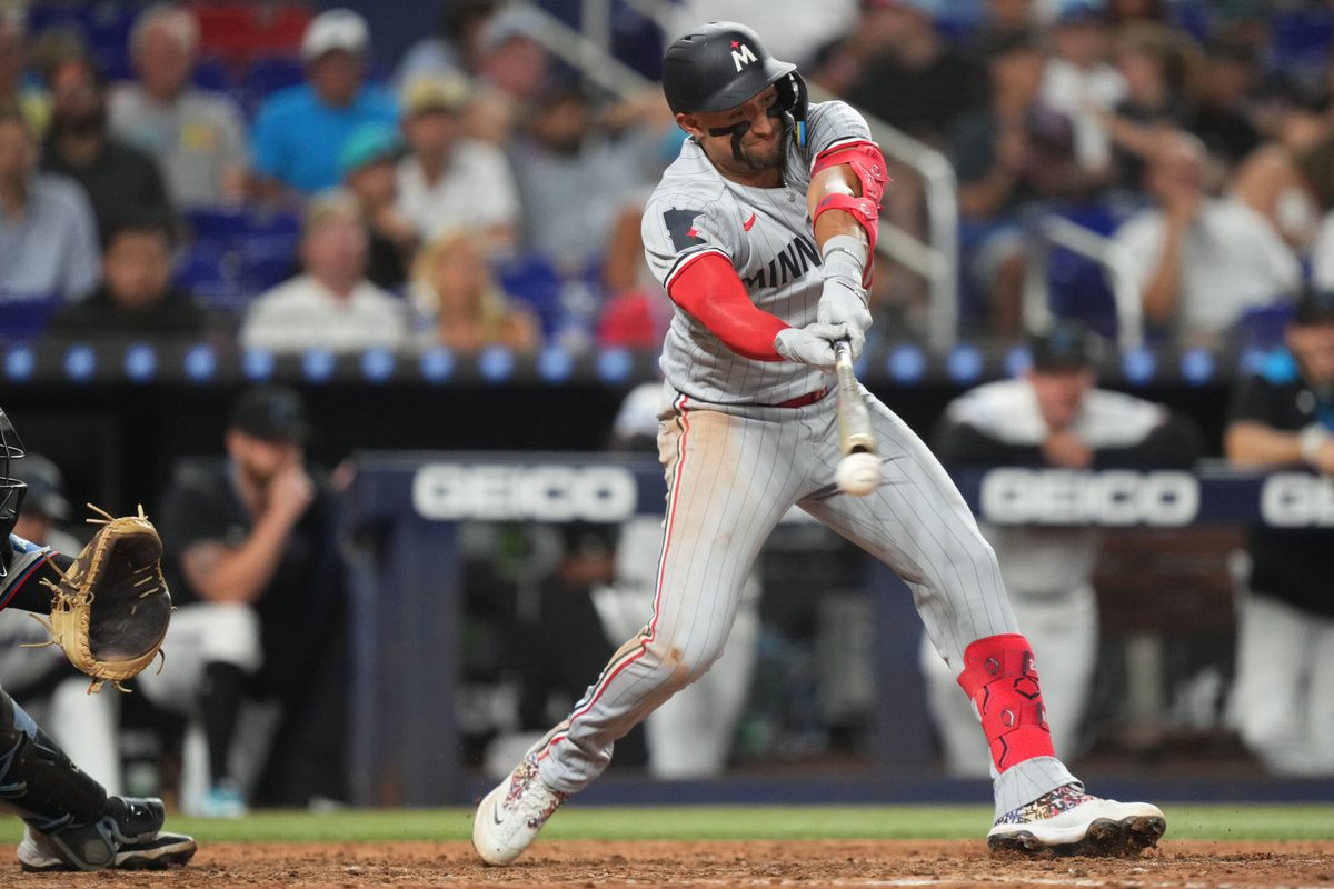 Jul 1, 2025; Miami, Florida, USA; Minnesota Twins third baseman Royce Lewis (23) strikes out in the eighth inning against the Miami Marlins at loanDepot Park. Mandatory Credit: Jim Rassol-Imagn Images