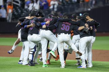Jul 2, 2025; New York City, New York, USA;  The New York Mets celebrate after defeating the Milwaukee Brewers 7-3 at Citi Field. Mandatory Credit: Wendell Cruz-Imagn Images