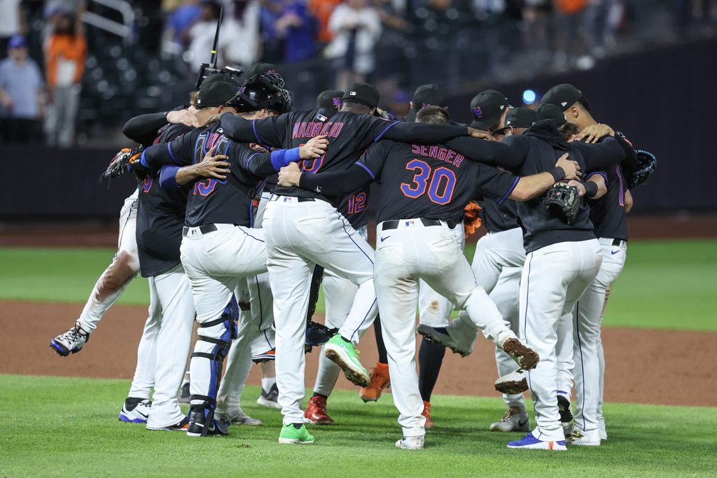 Jul 2, 2025; New York City, New York, USA; The New York Mets celebrate after defeating the Milwaukee Brewers 7-3 at Citi Field. Mandatory Credit: Wendell Cruz-Imagn Images