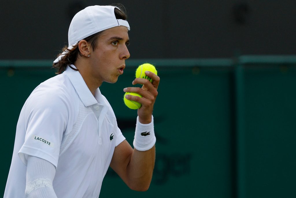 Jul 3, 2025; Wimbledon, United Kingdom; Arthur Cazaux (FRA) blows on his hand prior to serving against Alex de Minaur (AUS)(not pictured) on day four of The Championships Wimbledon 2025 at All England Lawn Tennis and Croquet Club. Mandatory Credit: Geoff Burke-Imagn Images