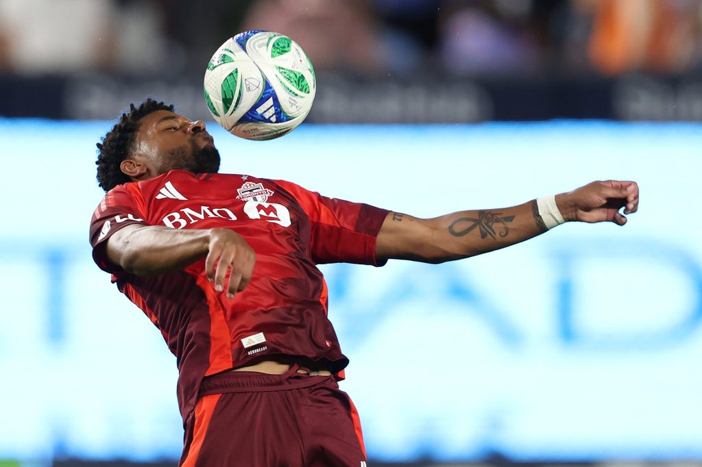 Jul 3, 2025; New York, New York, USA; Toronto FC midfielder Kosi Thompson (6) plays the ball against New York City FC during the second half at Yankee Stadium. Mandatory Credit: Vincent Carchietta-Imagn Images