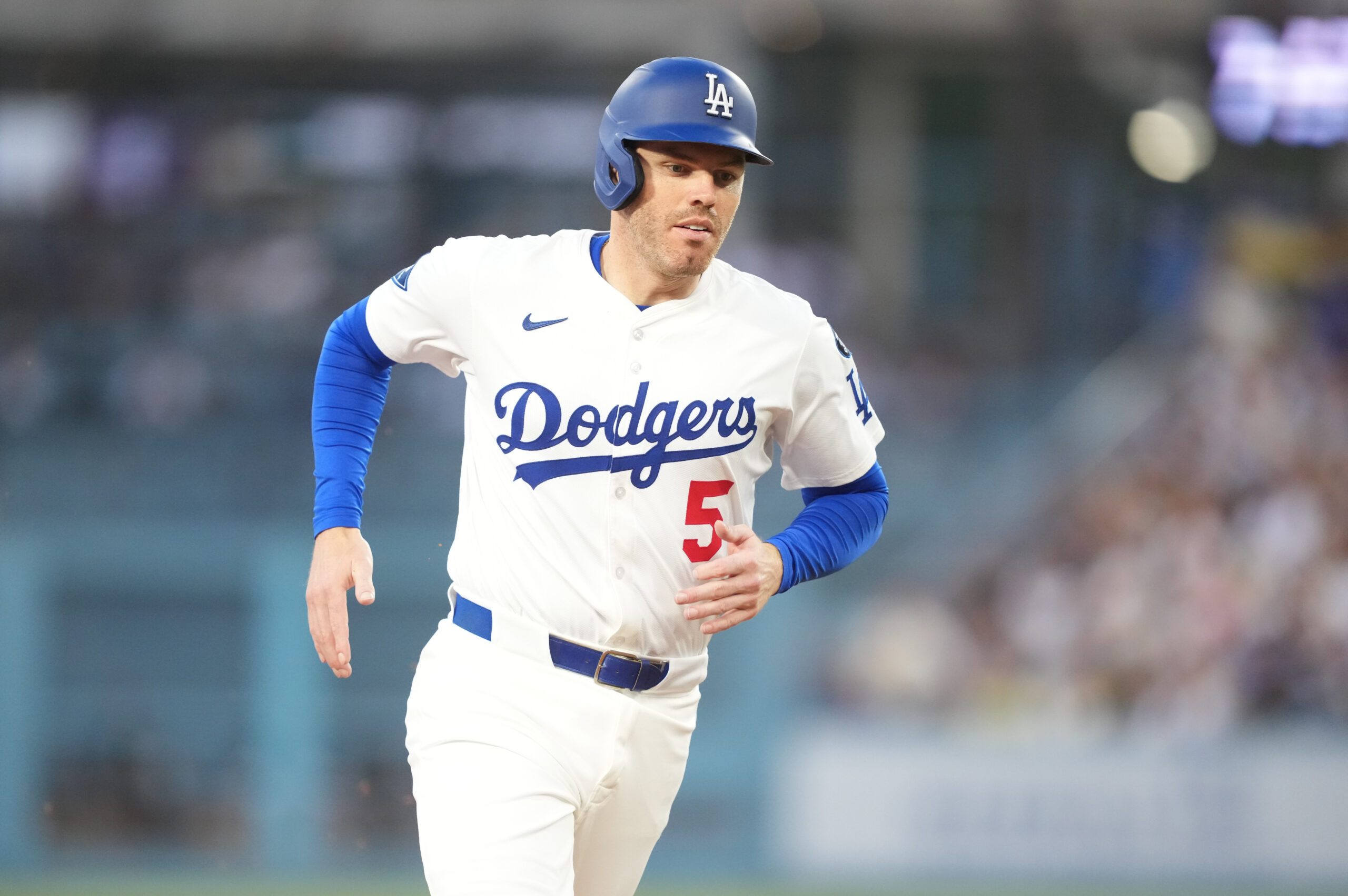 Jul 3, 2025; Los Angeles, California, USA; Los Angeles Dodgers first baseman Freddie Freeman (5) rounds the bases after Los Angeles Dodgers left fielder Michael Conforto (23) hits a two run home run during the third inning against the Chicago White Sox at Dodger Stadium. Mandatory Credit: Kirby Lee-Imagn Images