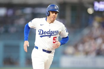 Jul 3, 2025; Los Angeles, California, USA; Los Angeles Dodgers first baseman Freddie Freeman (5) rounds the bases after Los Angeles Dodgers left fielder Michael Conforto (23) hits a two run home run during the third inning against the Chicago White Sox at Dodger Stadium. Mandatory Credit: Kirby Lee-Imagn Images