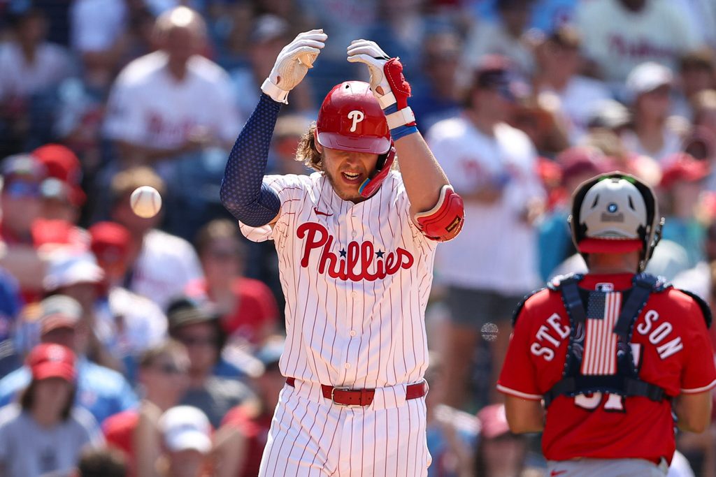 Jul 4, 2025; Philadelphia, Pennsylvania, USA; Philadelphia Phillies third base Alec Bohm (28) reacts after striking out with bases loaded to end the eighth inning against the Cincinnati Reds at Citizens Bank Park. Mandatory Credit: Bill Streicher-Imagn Images