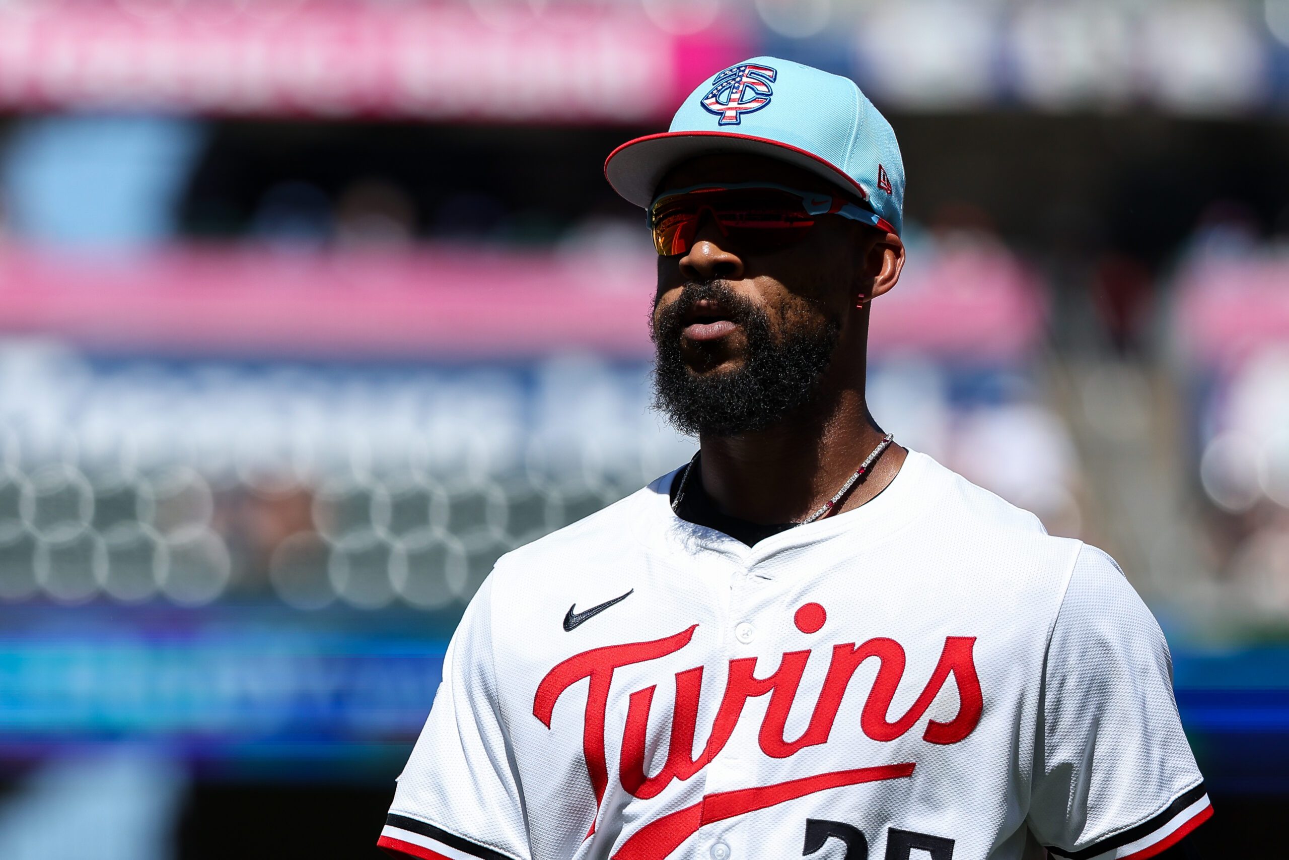 Jul 4, 2025; Minneapolis, Minnesota, USA; Minnesota Twins center fielder Byron Buxton (25) runs back to the dugout during the second inning against the Tampa Bay Rays at Target Field. Mandatory Credit: Matt Krohn-Imagn Images