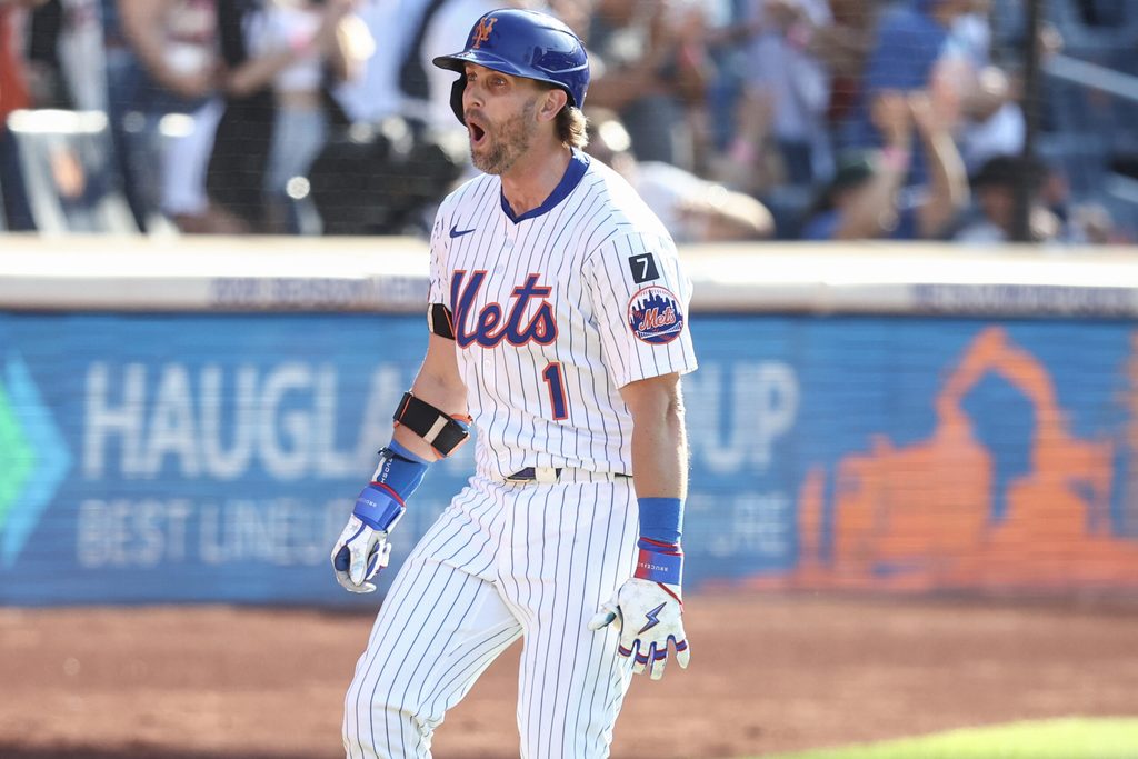 Jul 4, 2025; New York City, New York, USA; New York Mets second baseman Jeff McNeil (1) reacts after hitting a two run home run in the seventh inning against the New York Yankees at Citi Field. Mandatory Credit: Wendell Cruz-Imagn Images