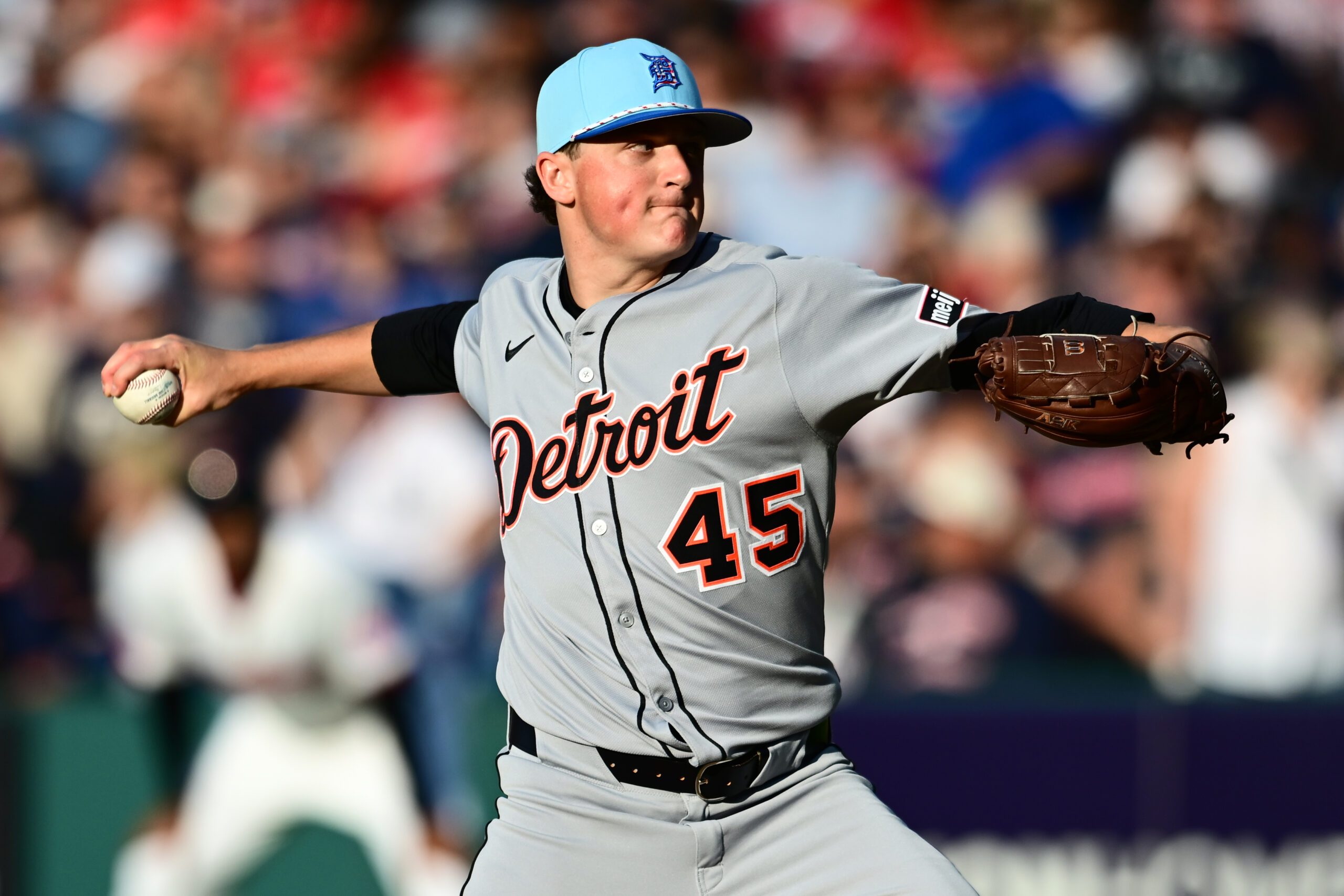 Jul 4, 2025; Cleveland, Ohio, USA; Detroit Tigers starting pitcher Reese Olson (45) throws a pitch during the first inning against the Cleveland Guardians at Progressive Field. Mandatory Credit: Ken Blaze-Imagn Images