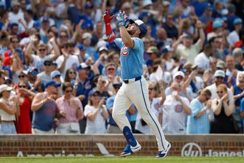 Jul 4, 2025; Chicago, Illinois, USA; Chicago Cubs first baseman Michael Busch (29) rounds the bases after hitting a solo home run against the St. Louis Cardinals during the seventh inning at Wrigley Field. Mandatory Credit: Kamil Krzaczynski-Imagn Images