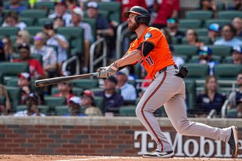 Jul 5, 2025; Cumberland, Georgia, USA; Baltimore Orioles third baseman Jordan Westburg (11) hits a two run home run against the Atlanta Braves during the third inning at Truist Park. Mandatory Credit: Dale Zanine-Imagn Images