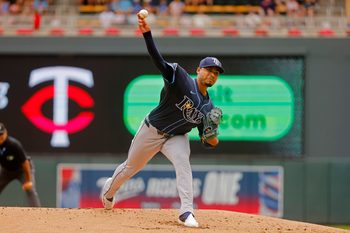 Jul 5, 2025; Minneapolis, Minnesota, USA; Tampa Bay Rays starting pitcher Taj Bradley (45) throws to the Minnesota Twins in the first inning at Target Field. Mandatory Credit: Bruce Kluckhohn-Imagn Images