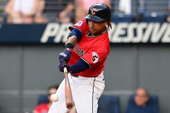 Jul 5, 2025; Cleveland, Ohio, USA; Cleveland Guardians designated hitter Jose Ramirez (11) hits a single during the fourth inning against the Detroit Tigers at Progressive Field. Mandatory Credit: Ken Blaze-Imagn Images