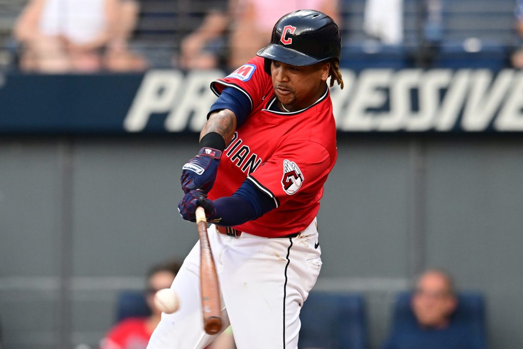 Jul 5, 2025; Cleveland, Ohio, USA; Cleveland Guardians designated hitter Jose Ramirez (11) hits a single during the fourth inning against the Detroit Tigers at Progressive Field. Mandatory Credit: Ken Blaze-Imagn Images