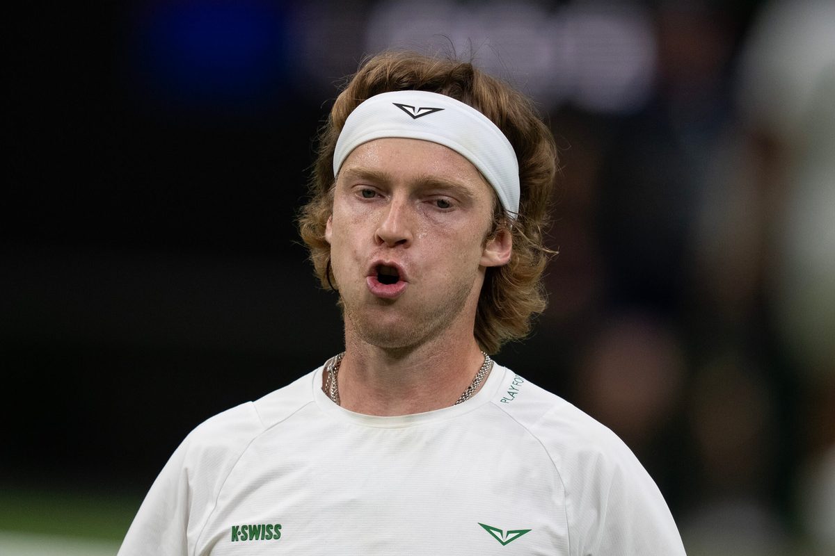 Jul 6, 2025; Wimbledon, United Kingdom; Andrey Rublev reacts to a point during his match against Carlos Alcaraz of Spain on day seven at the All England Lawn Tennis and Croquet Club. Mandatory Credit: Susan Mullane-Imagn Images
