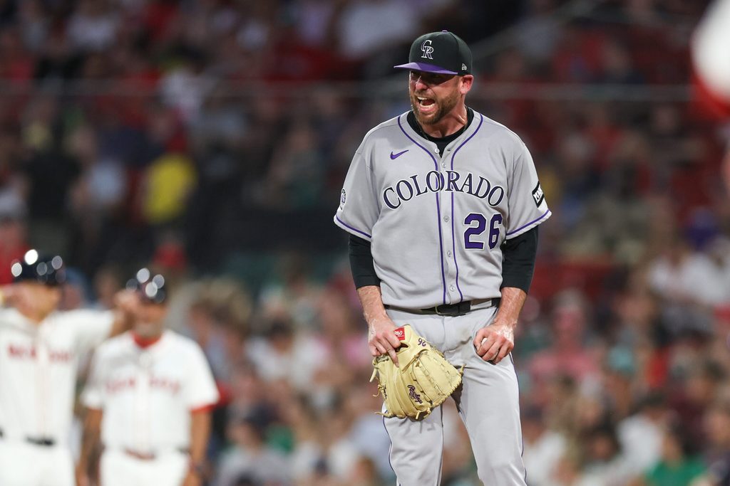 Jul 7, 2025; Boston, Massachusetts, USA; Colorado Rockies starting pitcher Austin Gomber (26) reacts during the fifth inning against the Boston Red Sox at Fenway Park. Mandatory Credit: Paul Rutherford-Imagn Images