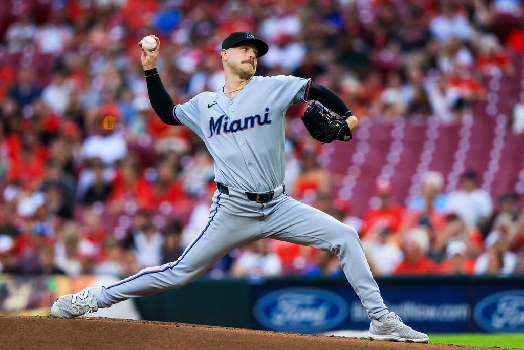 Jul 7, 2025; Cincinnati, Ohio, USA; Miami Marlins starting pitcher Janson Junk (26) pitches against the Cincinnati Reds in the first inning at Great American Ball Park. Mandatory Credit: Katie Stratman-Imagn Images