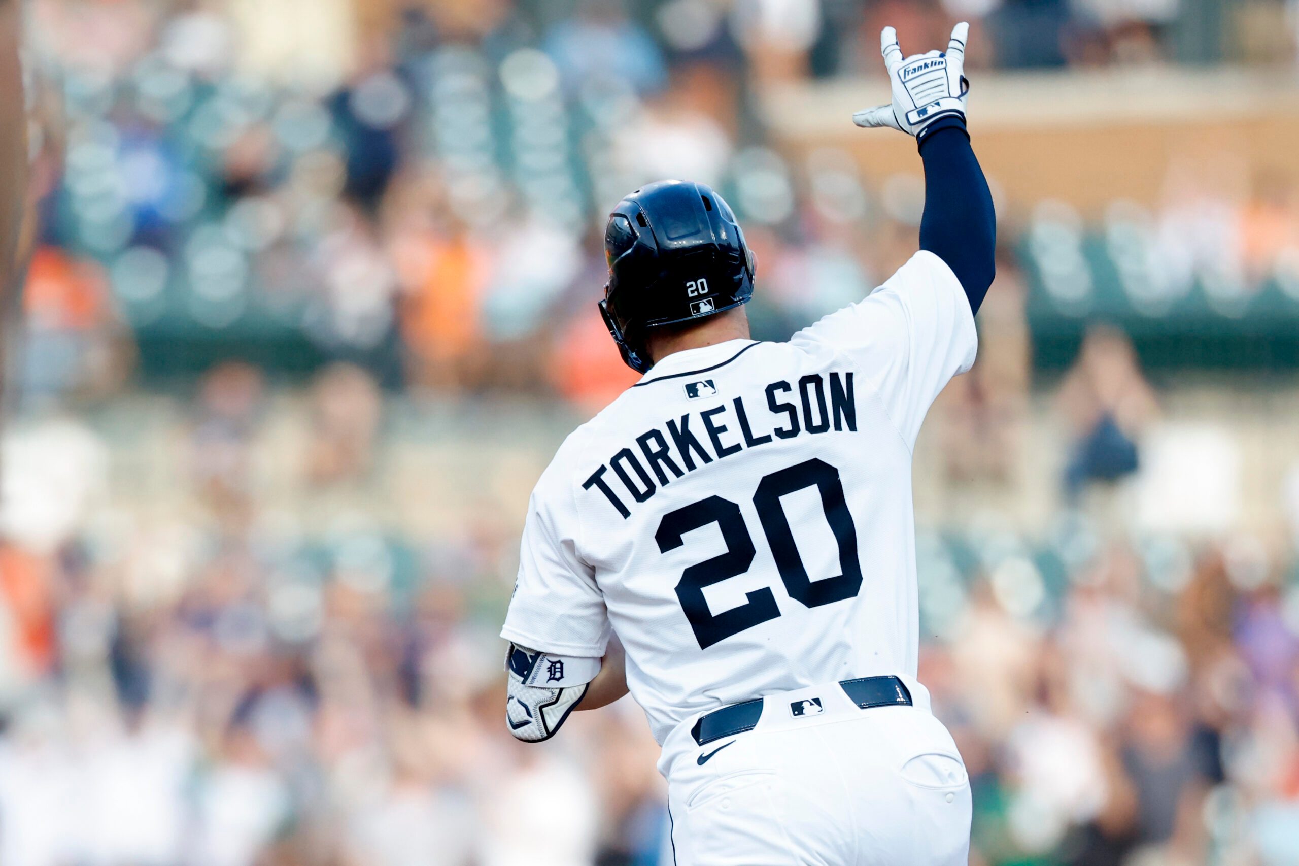 Jul 8, 2025; Detroit, Michigan, USA;  Detroit Tigers first baseman Spencer Torkelson (20) celebrates after he hits a home run in the fourth inning against the Tampa Bay Rays at Comerica Park. Mandatory Credit: Rick Osentoski-Imagn Images