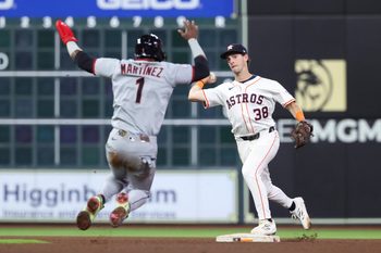 Jul 8, 2025; Houston, Texas, USA; Cleveland Guardians second baseman Angel Martinez (1) is out and Houston Astros shortstop Zack Short (38) throws to first base for a double play during the sixth inning at Daikin Park. Mandatory Credit: Troy Taormina-Imagn Images