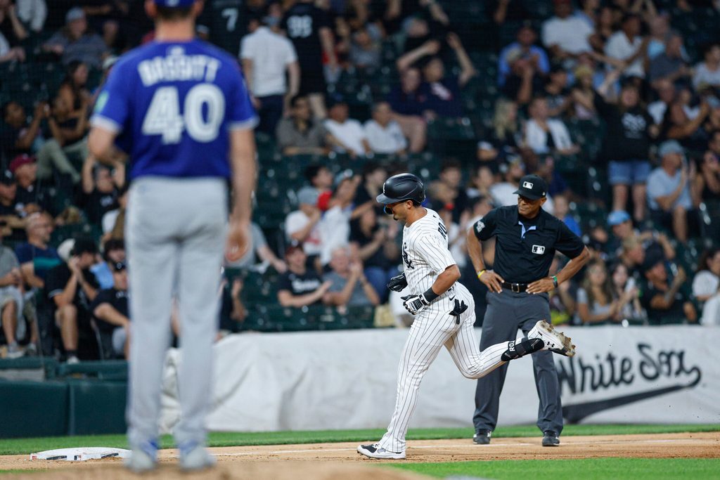 Jul 8, 2025; Chicago, Illinois, USA; Chicago White Sox third baseman Josh Rojas (5) rounds the bases after hitting a solo home run against the Toronto Blue Jays during the sixth inning at Rate Field. Mandatory Credit: Kamil Krzaczynski-Imagn Images