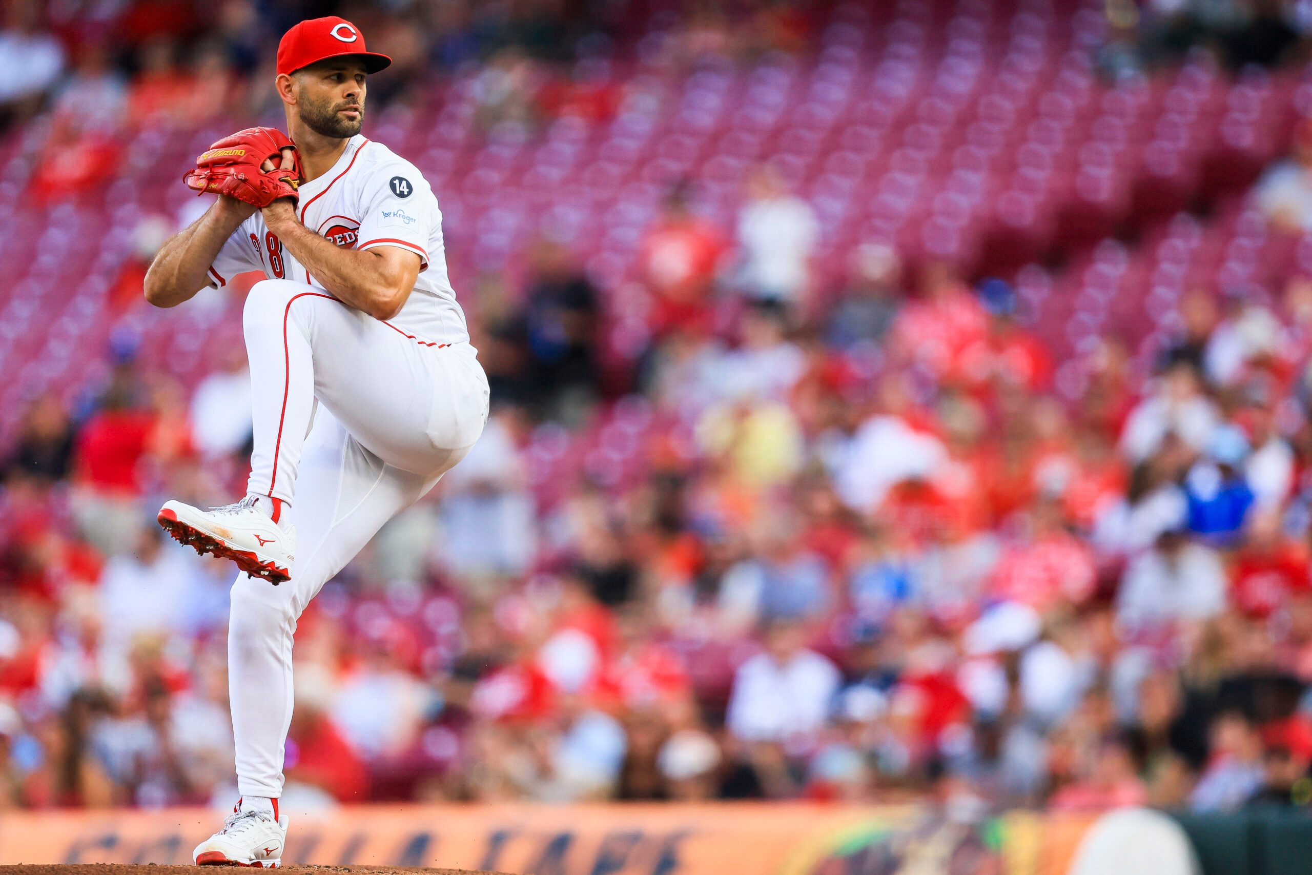 Jul 8, 2025; Cincinnati, Ohio, USA; Cincinnati Reds starting pitcher Nick Martinez (28) pitches against the Miami Marlins in the first inning at Great American Ball Park. Mandatory Credit: Katie Stratman-Imagn Images