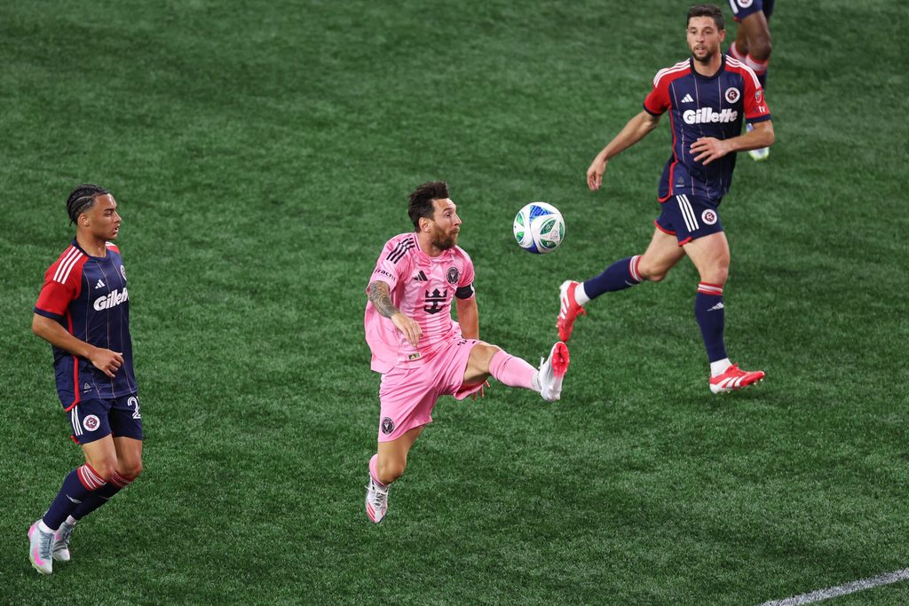 Jul 9, 2025; Foxborough, Massachusetts, USA; Inter Miami CF forward Lionel Messi (10) possesses the ball during the second half against the New England Revolution at Gillette Stadium. Mandatory Credit: Paul Rutherford-Imagn Images
