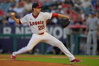 Jul 9, 2025; Anaheim, California, USA;  Los Angeles Angels starting pitcher Kyle Hendricks (28) delivers in the fourth inning against the Texas Rangers at Angel Stadium. Mandatory Credit: Jayne Kamin-Oncea-Imagn Images