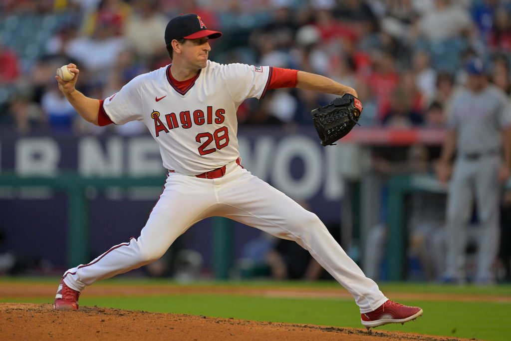 Jul 9, 2025; Anaheim, California, USA; Los Angeles Angels starting pitcher Kyle Hendricks (28) delivers in the fourth inning against the Texas Rangers at Angel Stadium. Mandatory Credit: Jayne Kamin-Oncea-Imagn Images