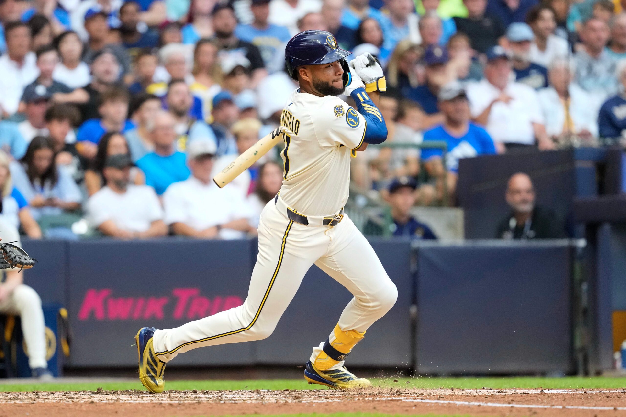 Jul 8, 2025; Milwaukee, Wisconsin, USA;  Milwaukee Brewers center fielder Jackson Chourio (11) bats during the game against the Los Angeles Dodgers at American Family Field. Mandatory Credit: Jeff Hanisch-Imagn Images