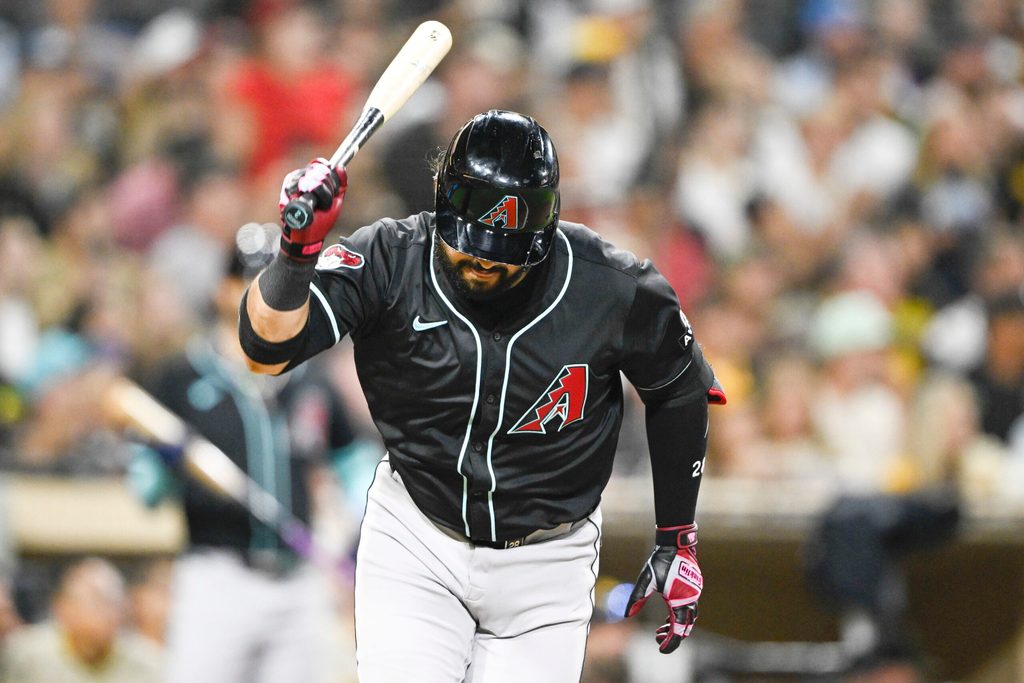 Jul 10, 2025; San Diego, California, USA; Arizona Diamondbacks third baseman Eugenio Suarez (28) tosses his bat after hitting a fly ball during the seventh inning against the San Diego Padres at Petco Park. Mandatory Credit: Denis Poroy-Imagn Images