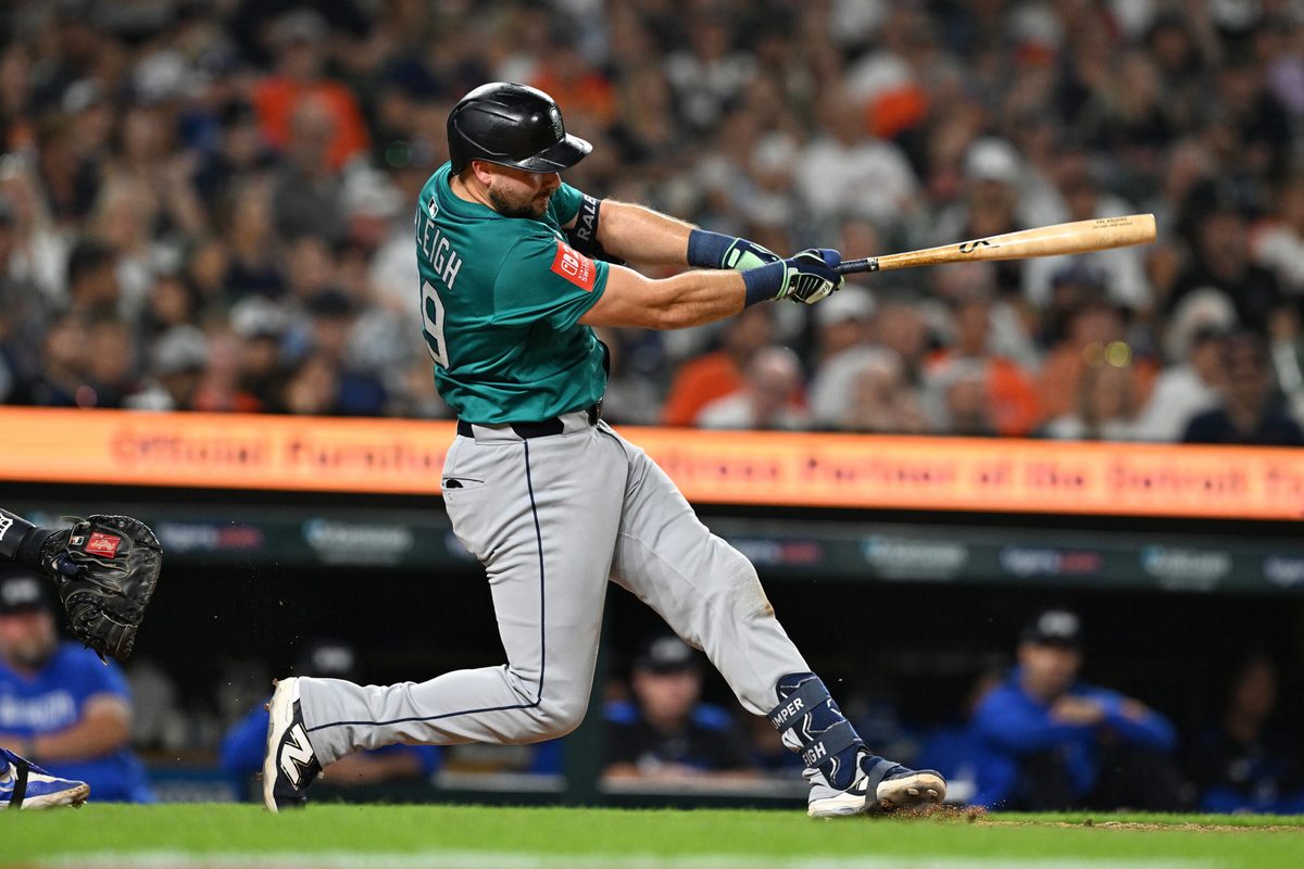 Jul 11, 2025; Detroit, Michigan, USA;  Seattle Mariners designated hitter Cal Raleigh (29) hits a grand slam home run against the Detroit Tigers in the ninth inning at Comerica Park. Mandatory Credit: Lon Horwedel-Imagn Images