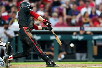 Cincinnati Reds outfielder TJ Friedl (29) hits a RBI in the seventh inning of a MLB game between the Cincinnati Reds and Colorado Rockies, Friday, July 11, 2025, at Great American Ball Park in Downtown Cincinnati. Rockies won 3-2.