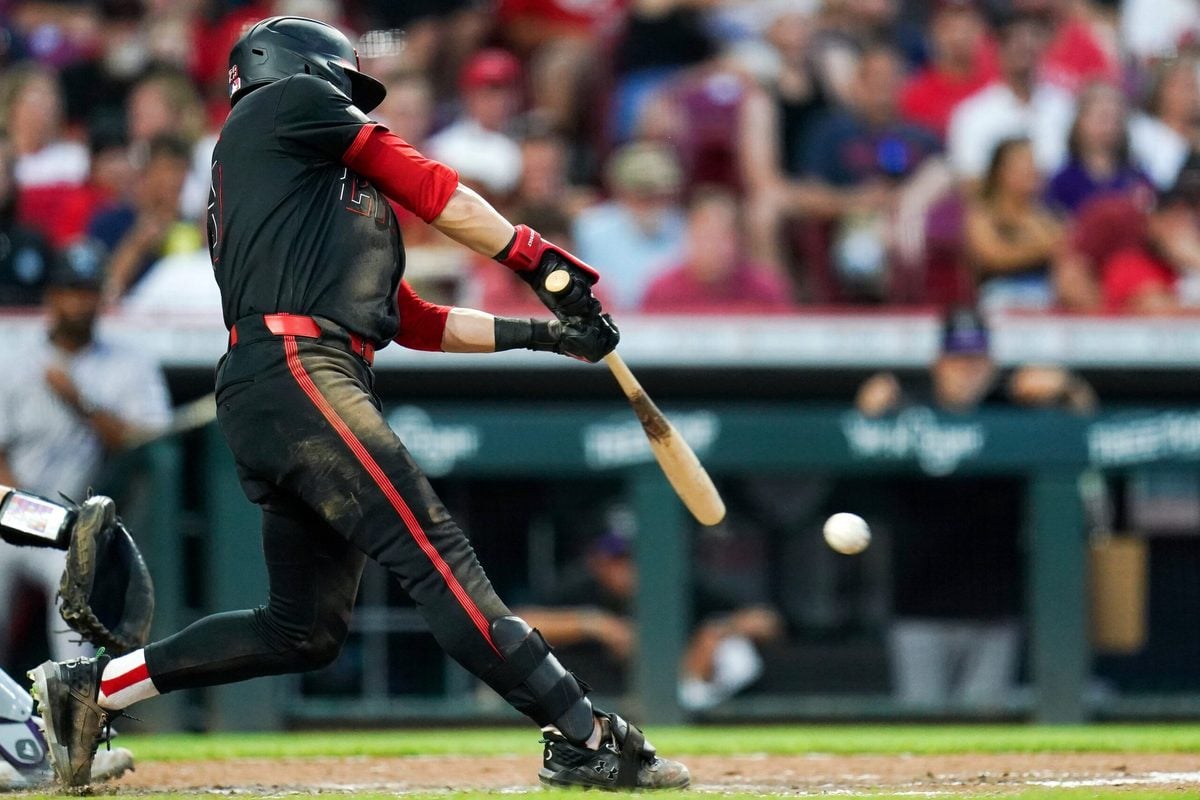 Cincinnati Reds outfielder TJ Friedl (29) hits a RBI in the seventh inning of a MLB game between the Cincinnati Reds and Colorado Rockies, Friday, July 11, 2025, at Great American Ball Park in Downtown Cincinnati. Rockies won 3-2.