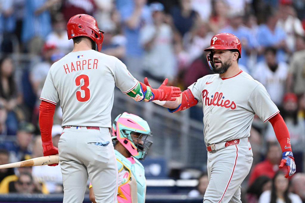 Jul 11, 2025; San Diego, California, USA; Philadelphia Phillies left fielder Kyle Schwarber (12) is congratulated by Bryce Harper (3) bases after hitting a solo home run during the third inning against the San Diego Padres at Petco Park. Mandatory Credit: Denis Poroy-Imagn Images