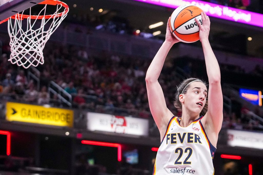 Indiana Fever guard Caitlin Clark (22) rebounds the ball Wednesday, July 9, 2025, during a game between the Indiana Fever and the Golden State Valkyries at Gainbridge Fieldhouse in Indianapolis. The Golden State Valkyries defeated the Indiana Fever, 80-61.
