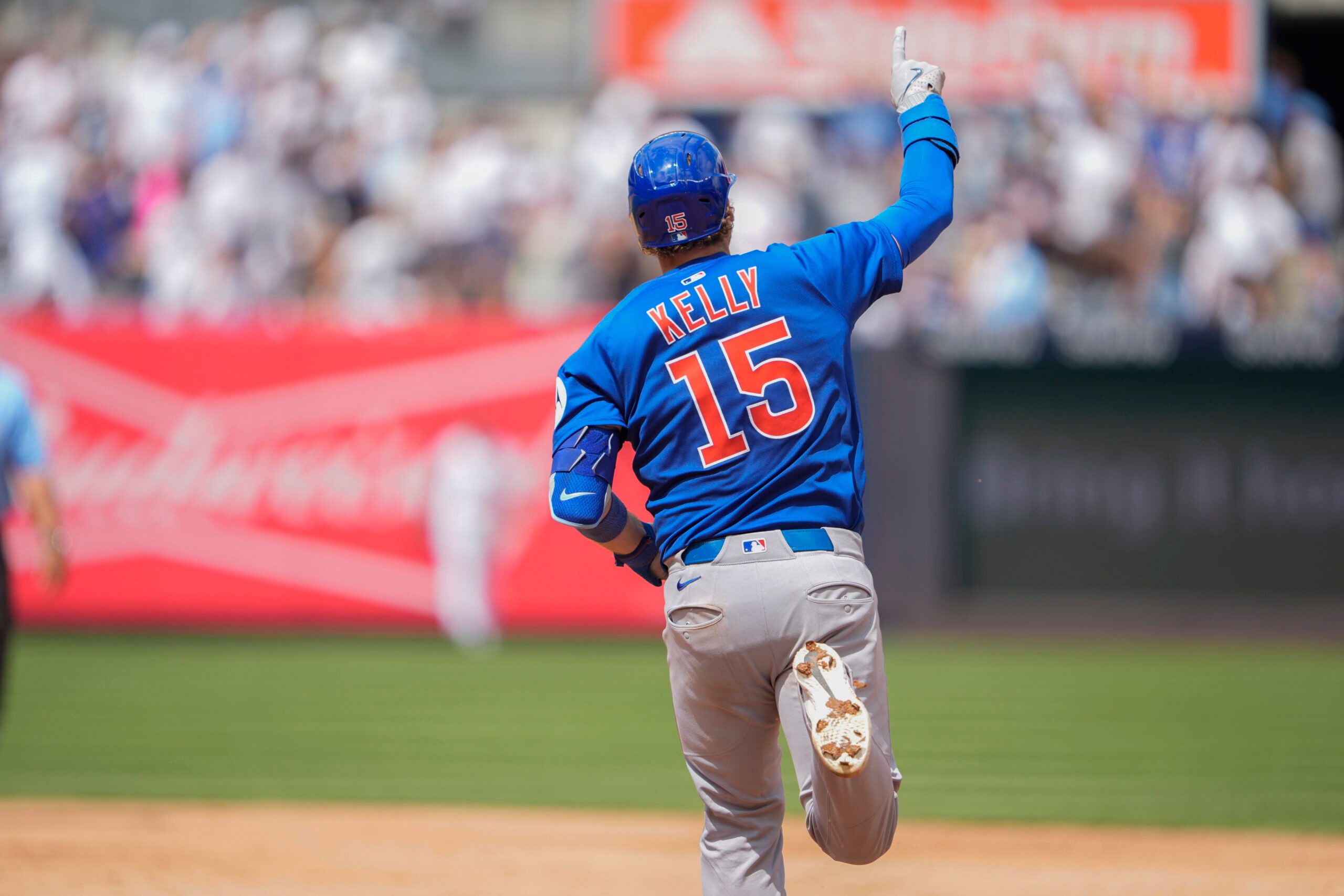 Jul 12, 2025; Bronx, New York, USA; Chicago Cubs catcher Carson Kelly (15) reacts to hitting a home run against the New York Yankees during the eighth inning at Yankee Stadium. Mandatory Credit: Gregory Fisher-Imagn Images