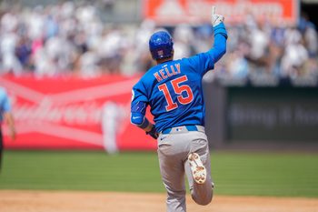 Jul 12, 2025; Bronx, New York, USA; Chicago Cubs catcher Carson Kelly (15) reacts to hitting a home run against the New York Yankees during the eighth inning at Yankee Stadium. Mandatory Credit: Gregory Fisher-Imagn Images