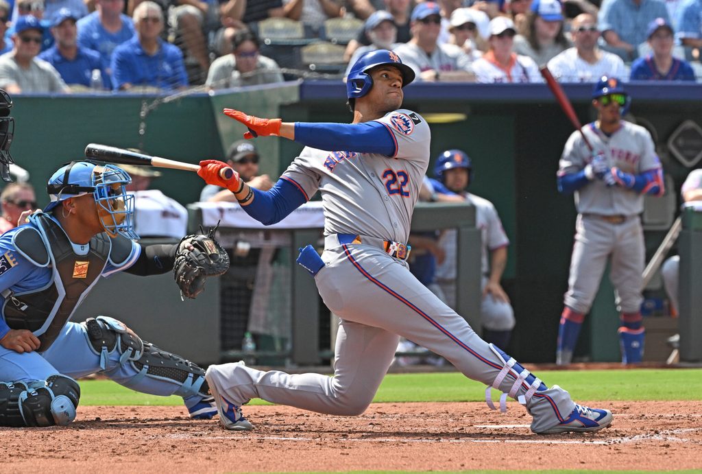 Jul 12, 2025; Kansas City, Missouri, USA; New York Mets designated hitter Juan Soto (22) hits a two-run home run in the fourth inning against the Kansas City Royals at Kauffman Stadium. Mandatory Credit: Peter Aiken-Imagn Images