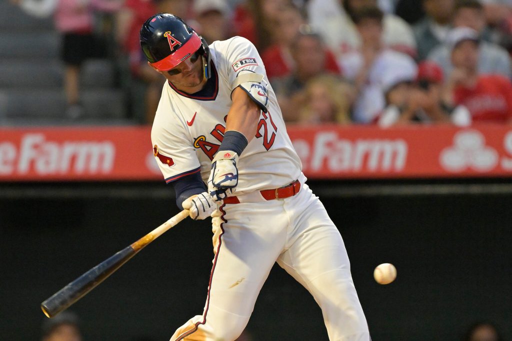 Jul 12, 2025; Anaheim, California, USA; Los Angeles Angels right fielder Mike Trout (27) hits a two-run home run during the fifth inning against the Arizona Diamondbacks at Angel Stadium. Mandatory Credit: Jayne Kamin-Oncea-Imagn Images