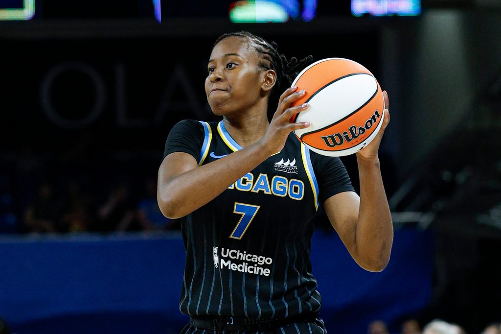 Jul 12, 2025; Chicago, Illinois, USA; Chicago Sky guard Ariel Atkins (7) looks to pass the ball against the Minnesota Lynx during the second half of a WNBA game at Wintrust Arena. Mandatory Credit: Kamil Krzaczynski-Imagn Images