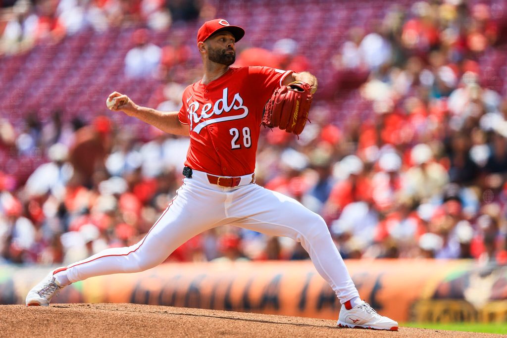 Jul 13, 2025; Cincinnati, Ohio, USA; Cincinnati Reds starting pitcher Nick Martinez (28) pitches against the Colorado Rockies in the first inning at Great American Ball Park. Mandatory Credit: Katie Stratman-Imagn Images
