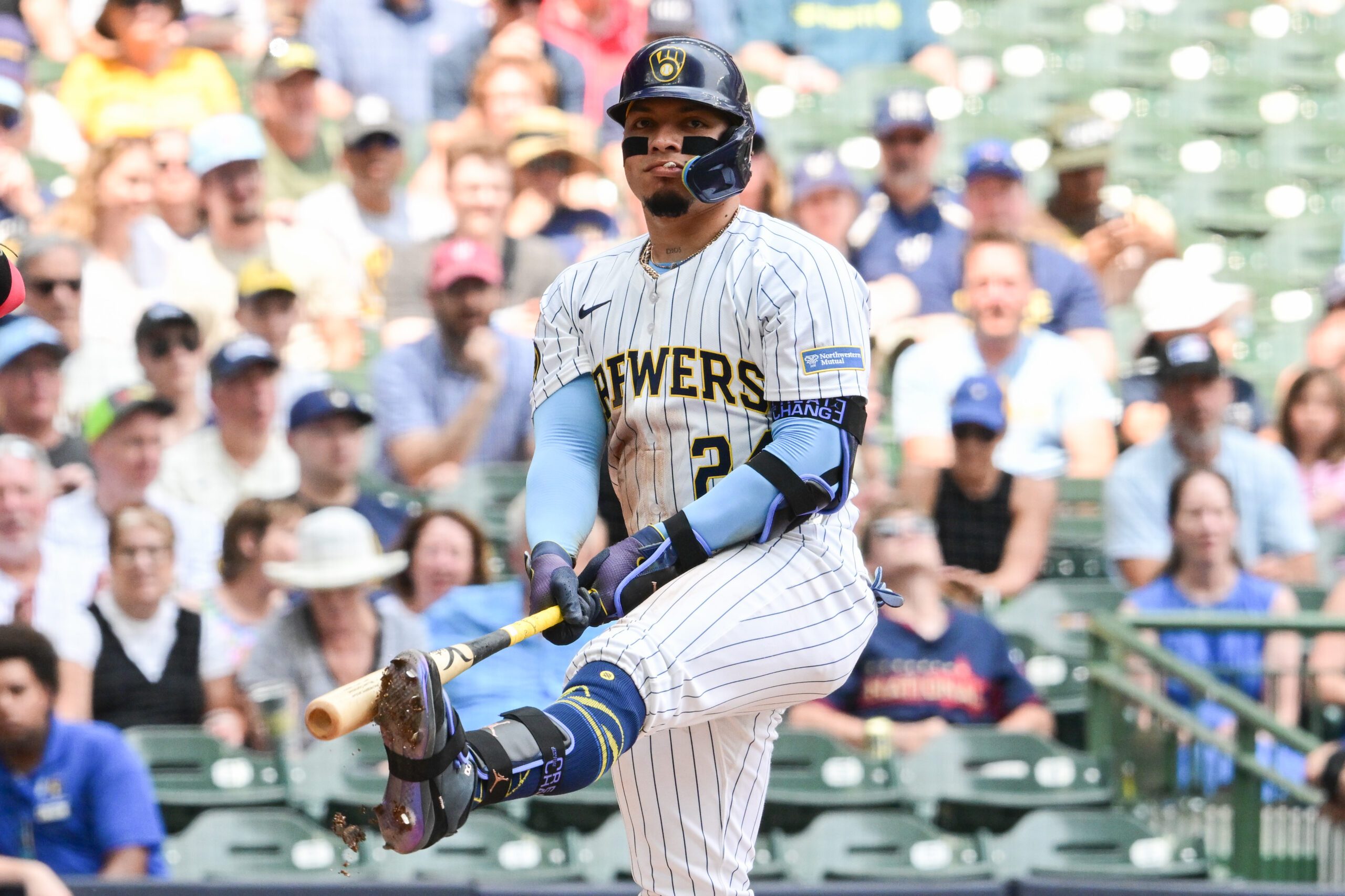 Jul 13, 2025; Milwaukee, Wisconsin, USA; Milwaukee Brewers designated hitter William Contreras (24) reacts after striking our in the second inning against the Washington Nationals at American Family Field. Mandatory Credit: Benny Sieu-Imagn Images