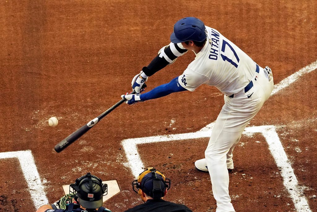 Jul 15, 2025; Cumberland, Georgia, USA; National League designated hitter Shohei Ohtani (17) of the Los Angeles Dodgers hits a single during the first inning during the 2025 MLB All Star Game at Truist Park. Mandatory Credit: Dale Zanine-Imagn Images