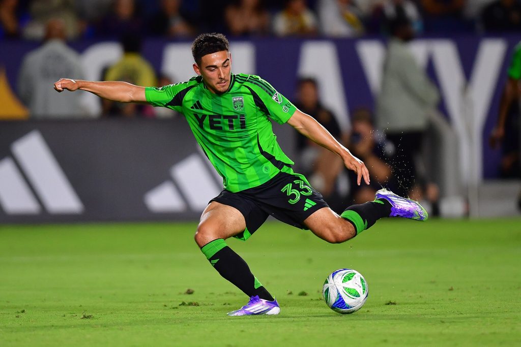 Jul 16, 2025; Carson, California, USA; Austin FC midfielder Owen Wolff (33) scores a goal against the LA Galaxy during the second half at Dignity Health Sports Park. Mandatory Credit: Gary A. Vasquez-Imagn Images