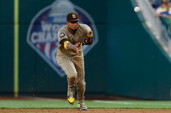 Jul 18, 2025; Washington, District of Columbia, USA; San Diego Padres first baseman Luis Arraez (4) tosses a fielded ground ball to first base against the Washington Nationals during the third inning at Nationals Park. Mandatory Credit: Geoff Burke-Imagn Images