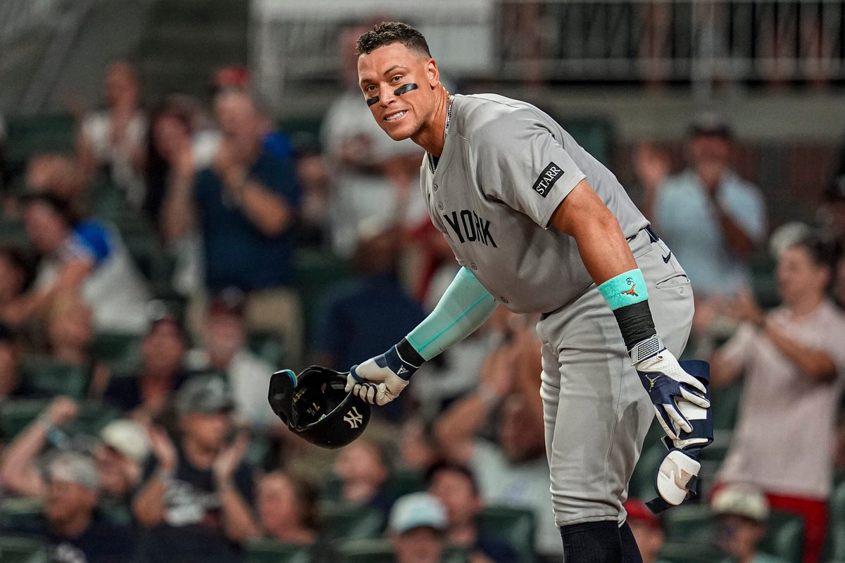 Jul 18, 2025; Cumberland, Georgia, USA; New York Yankees right fielder Aaron Judge (99) reacts after striking out against the  Atlanta Braves during the seventh inning at Truist Park. Mandatory Credit: Dale Zanine-Imagn Images