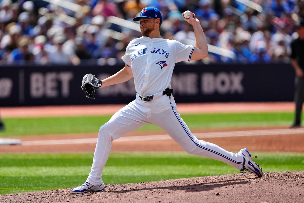 Jul 19, 2025; Toronto, Ontario, CAN; Toronto Blue Jays starting pitcher Eric Lauer (56) pitches to the San Francisco Giants during the third inning at Rogers Centre. Mandatory Credit: John E. Sokolowski-Imagn Images