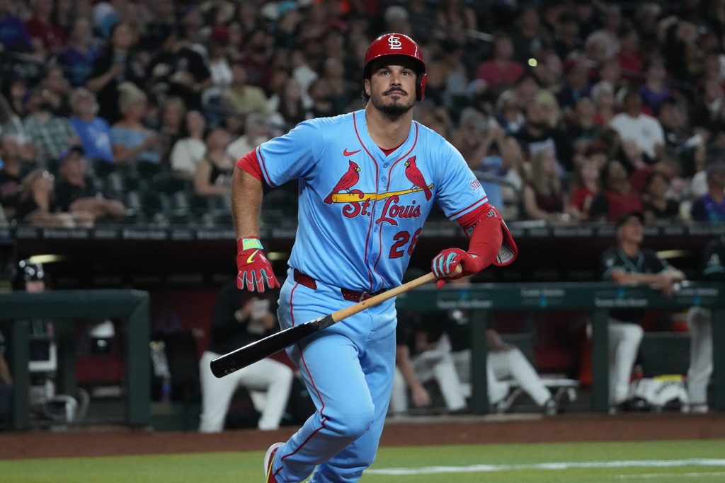 Jul 19, 2025; Phoenix, Arizona, USA; St. Louis Cardinals third base Nolan Arenado (28) reacts after missing a pitch against the Arizona Diamondbacks in the sixth inning at Chase Field. Mandatory Credit: Rick Scuteri-Imagn Images