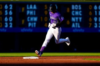 Jul 19, 2025; Denver, Colorado, USA; Colorado Rockies third base Ryan McMahon (24) runs off a two-run home run in the third inning against the Minnesota Twins at Coors Field. Mandatory Credit: Ron Chenoy-Imagn Images